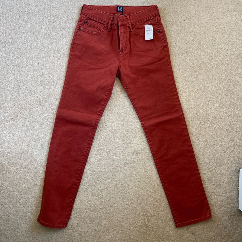 Gap red skinny jeans, never worn
